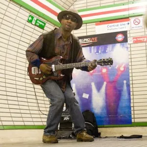 A busker at London's Tottenham Court Road underground station